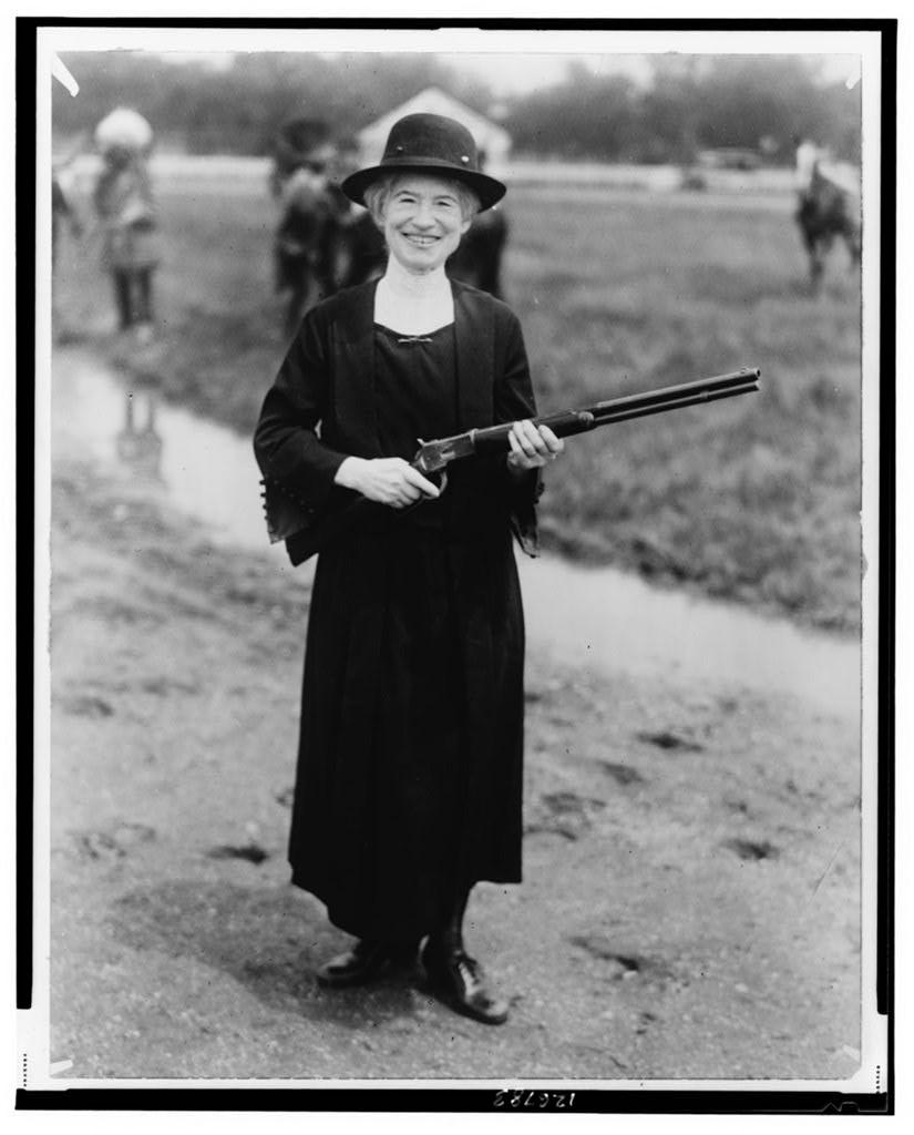 Annie Oakley, with gun Buffalo Bill gave her / staff photo. Annie Oakley, with gun Buffalo Bill gave her / staff photo.